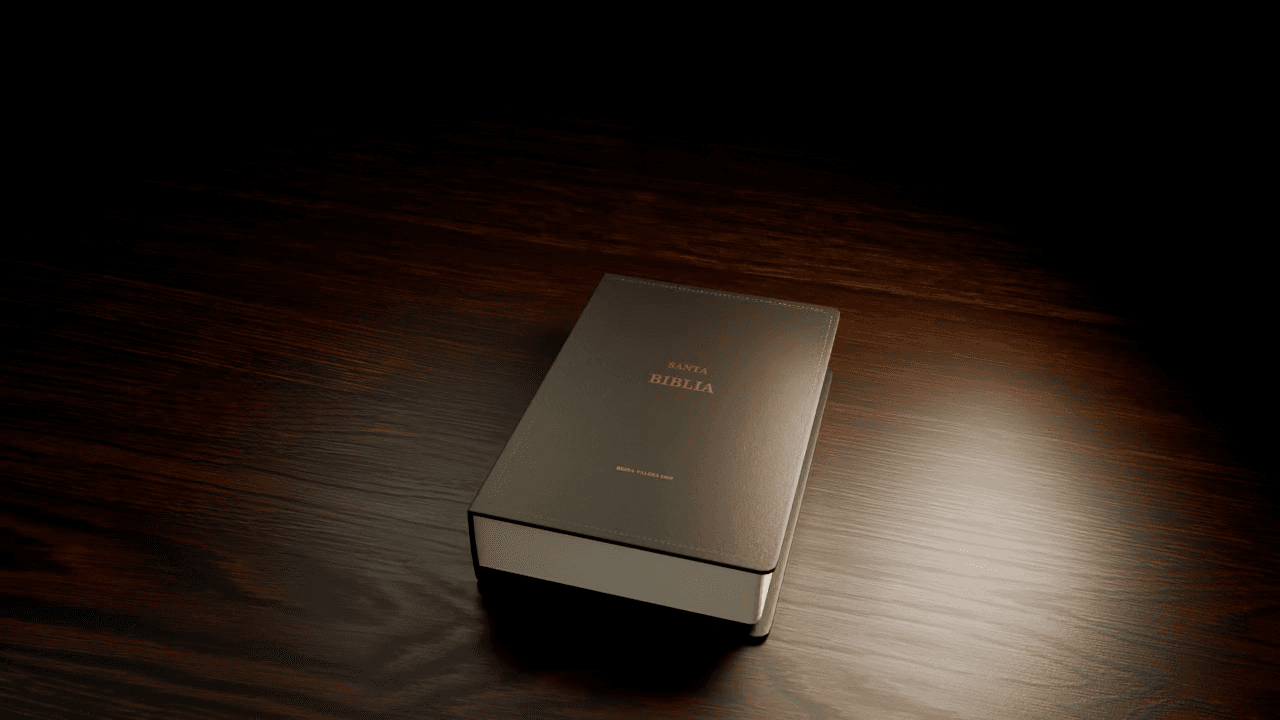 A dark Bible on a wooden table illuminated by a moving cinematic light